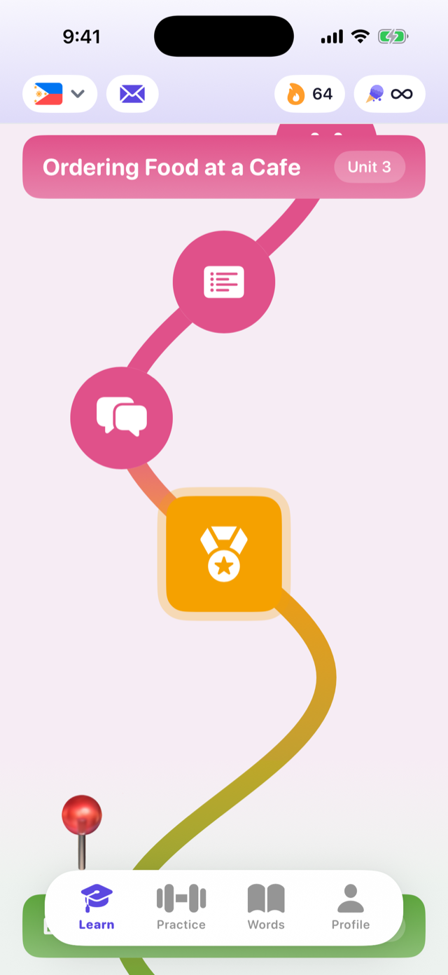The Tagalog 2.0 learn map, a winding path of completed units with a milestone medal